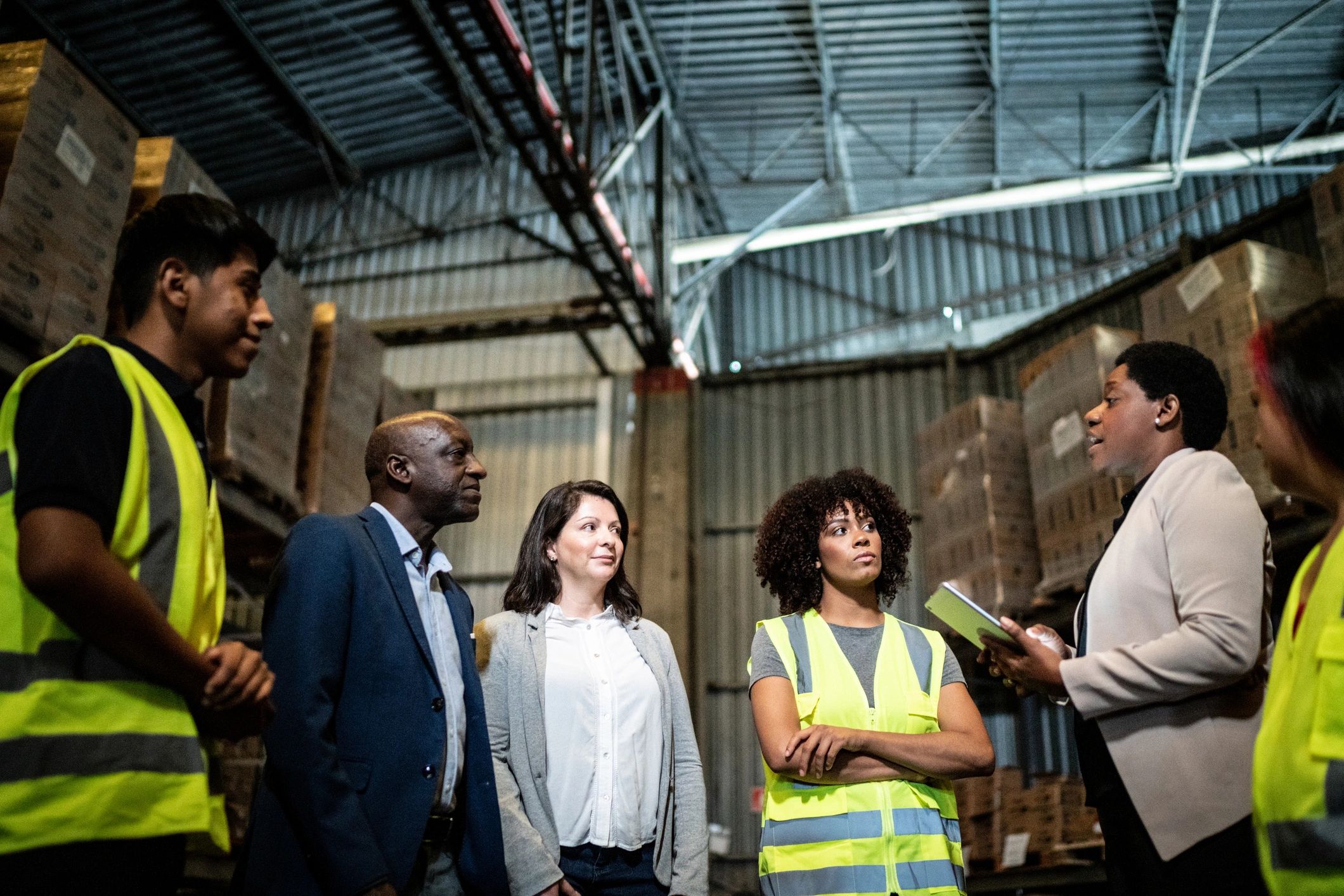 Service team meeting in a warehouse