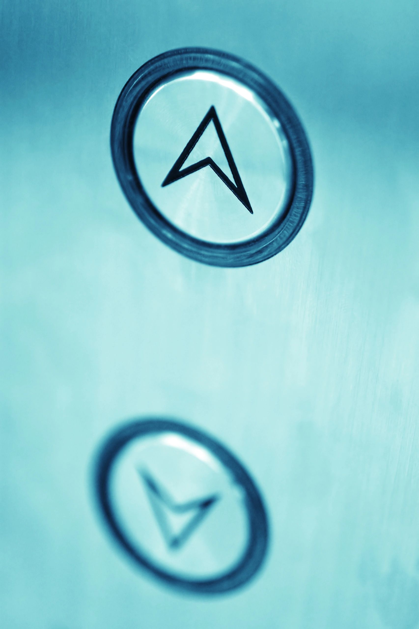 Close-up of elevator up and down buttons